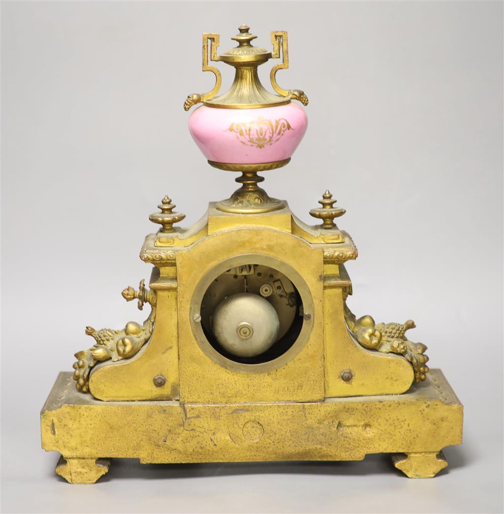 A 19th century French gilt metal and porcelain inset mantel clock, height 37cm